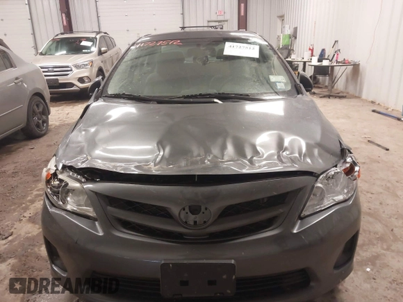 2012 Toyota Corolla L with VIN 5YFBU4EE9CP047479, listed as a IAAI auction lot 41727512 with 128,970 mi miles. Bid and sale history available at carsss.com. Image 13.