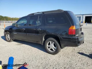 2005 GMC Envoy XL SLT with VIN 1GKET16S256109757, listed as a Copart auction lot 77220144 with 246,444 mi miles and Salvage Title. Bid and sale history available at carsss.com. Image 2.
