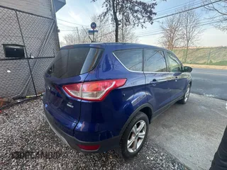 2013 Ford Escape SE with VIN 1FMCU9GX9DUA32769, listed as a Copart auction lot 46907285 with 125,348 mi miles and Clean Title. Bid and sale history available at DreamBid. Image 4.