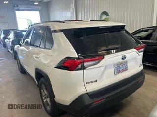 2022 Toyota RAV4 Hybrid XLE with VIN JTMRWRFV1ND164886, listed as a IAAI auction lot 42671926 with 97,775 mi miles and . Bid and sale history available at DreamBid. Image 1.