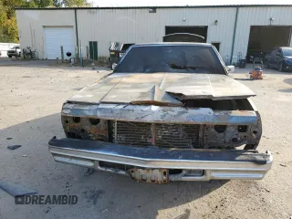 1977 Chevrolet Impala с VIN IL69U7J272968, выставлен на аукционе Copart как лот 75909154 с пробегом Не указан миль и Списание • Salvage title. История ставок и продаж доступна на DreamBid. Изображение 5.