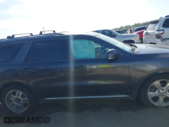 2014 Dodge Durango Limited with VIN 1C4RDHDG6EC277775, listed as a IAAI auction lot 42619740 with 206,936 mi miles and . Bid and sale history available at DreamBid. Image 13.