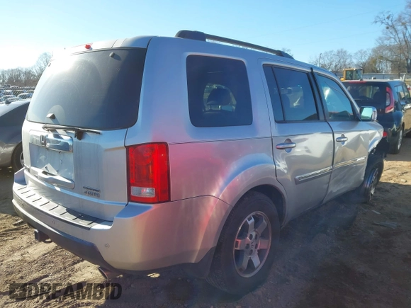 2009 Honda Pilot Touring with VIN 5FNYF48979B008851, listed as a IAAI auction lot 41252736 with 183,292 mi miles and . Bid and sale history available at carsss.com. Image 4.