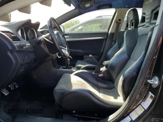 2008 Mitsubishi Lancer Evolution GSR with VIN JA3AW86V58U049914, listed as a Copart auction lot 62105824 with 129,622 mi miles and Salvage Title. Bid and sale history available at carsss.com. Image 7.