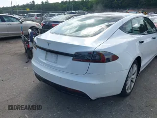 2021 Tesla Model S Long Range with VIN 5YJSA1E57MF428512, listed as a IAAI auction lot 42511020 with 29,611 mi miles and . Bid and sale history available at DreamBid. Image 16.
