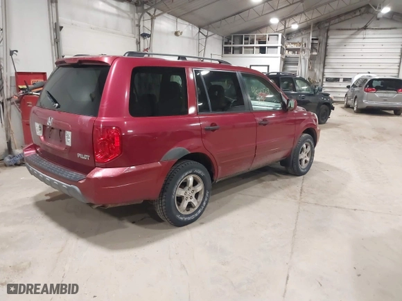 2004 Honda Pilot EX with VIN 2HKYF18584H588973, listed as a IAAI auction lot 41800129 with 221,498 mi miles. Bid and sale history available at carsss.com. Image 4.