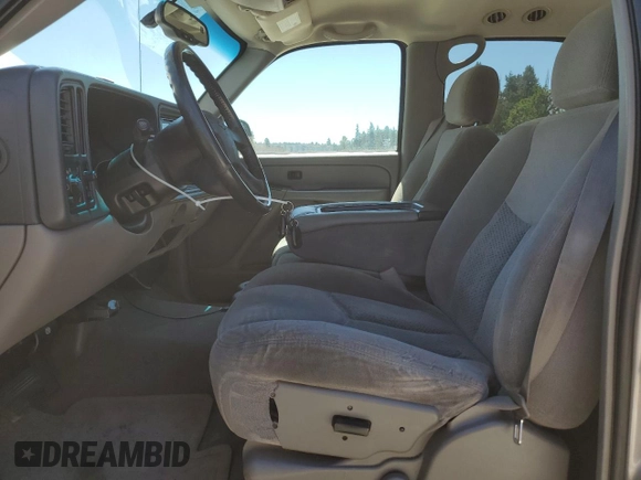 2004 Chevrolet Tahoe LS with VIN 1GNEC13V24J321605, listed as a Copart auction lot 64476065 with 176,551 mi miles and Salvage title. Bid and sale history available at DreamBid. Image 7.