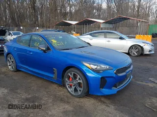 2018 Kia Stinger GT2 with VIN KNAE55LC0J6015863, listed as a IAAI auction lot 41407794 with 98,079 mi miles. Bid and sale history available at carsss.com. Image 1.