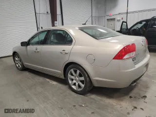2010 Mercury Milan Premier with VIN 3MEHM0CG8AR655281, listed as a Copart auction lot 87126464 with 128,760 mi miles and Clean Title. Bid and sale history available at carsss.com. Image 2.