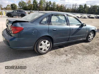 2004 Saturn L with VIN 1G8JC54F64Y517280, listed as a Copart auction lot 76351844 with 92,661 mi miles and Salvage Title. Bid and sale history available at carsss.com. Image 3.