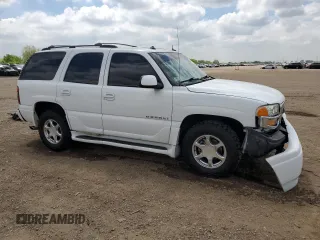 2003 GMC Yukon Denali z VIN 1GKEK63U33J316027, wystawiony jako Copart lot #56869815 z przebiegiem 200 916 mil mil oraz Szkoda całkowita • Salvage title. Historia ofert i sprzedaży dostępna na DreamBid. Obrazek 4.