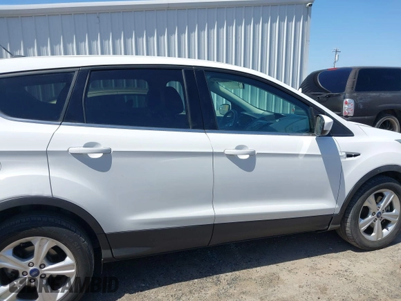 2015 Ford Escape SE with VIN 1FMCU0G91FUC65044, listed as a IAAI auction lot 42083688 with 111,972 mi miles and . Bid and sale history available at carsss.com. Image 14.