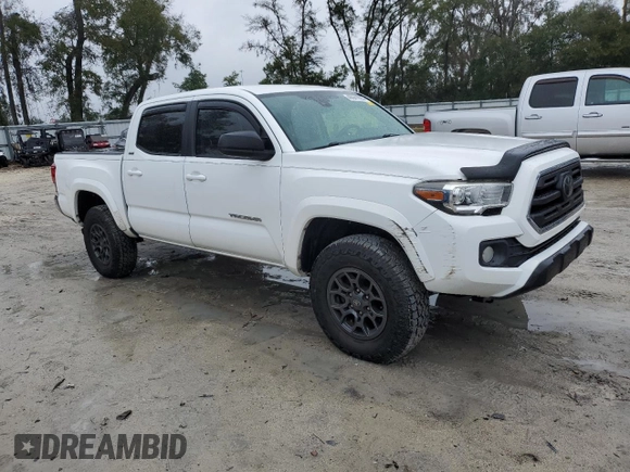 2018 Toyota Tacoma SR5 with VIN 5TFAZ5CN8JX071079, listed as a Copart auction lot 46641965 with 199,004 mi miles and Clean Title. Bid and sale history available at DreamBid. Image 4.