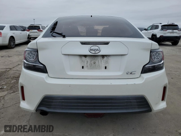 2016 Scion tC with VIN JTKJF5C73GJ019812, listed as a Copart auction lot 84228844 with 153,692 mi miles and Salvage Title. Bid and sale history available at carsss.com. Image 6.