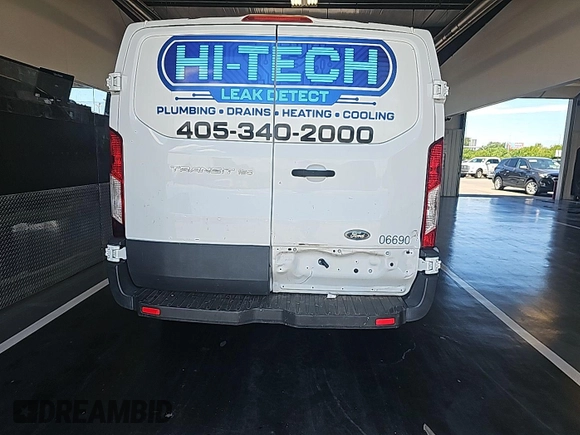 2016 Ford Transit Cargo with VIN 1FTYE1ZM0GKB06690, listed as a IAAI auction lot 42677893 with 295,974 mi miles and . Bid and sale history available at DreamBid. Image 18.