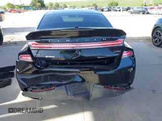2014 Lincoln MKZ Hybrid z VIN 3LN6L2LU5ER831041, wystawiony jako IAAI lot #42447895 z przebiegiem 92 102 mil mil oraz . Historia ofert i sprzedaży dostępna na DreamBid. Obrazek 16.