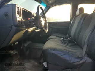 2000 Chevrolet Silverado 1500 with VIN 2GCEC19WXY1113447, listed as a Copart auction lot 77107304 with 242,406 mi miles and Salvage Title. Bid and sale history available at DreamBid. Image 7.