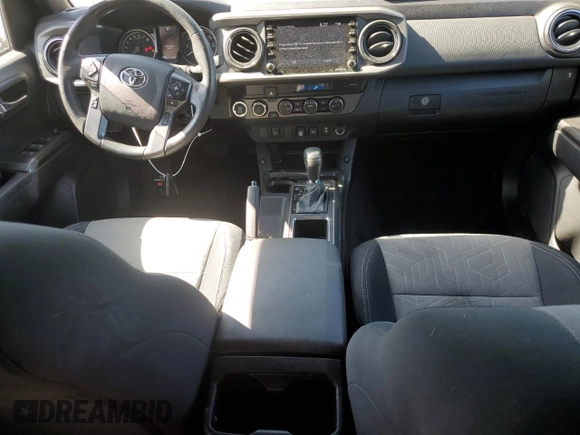 2022 Toyota Tacoma SR с VIN 3TMCZ5AN8NM519084, выставлен на аукционе Copart как лот 57512005 с пробегом 23 692 миль миль и Списание • Salvage title. История ставок и продаж доступна на DreamBid. Изображение 8.