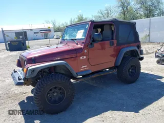 2004 Jeep Wrangler X with VIN 1J4FA39SX4P717980, listed as a IAAI auction lot 42334875 with 141,584 mi miles and . Bid and sale history available at DreamBid. Image 2.