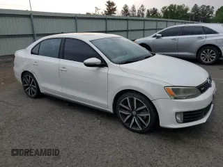 2014 Volkswagen Jetta GLI with VIN 3VW4T7AJ4EM384679, listed as a Copart auction lot 64014195 with 137,793 mi miles and Clean title. Bid and sale history available at DreamBid. Image 4.