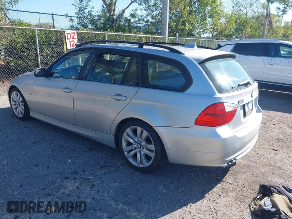 2007 BMW 3 Series 328i with VIN WBAVS13547FX16529, listed as a IAAI auction lot 41769488 with 88,993 mi miles. Bid and sale history available at carsss.com. Image 3.
