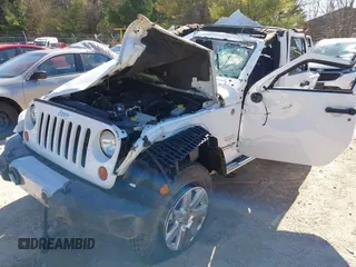 2013 Jeep Wrangler Unlimited Moab with VIN 1C4HJWEG7DL569862, listed as a IAAI auction lot 42095535 with Not provided miles and . Bid and sale history available at DreamBid. Image 2.