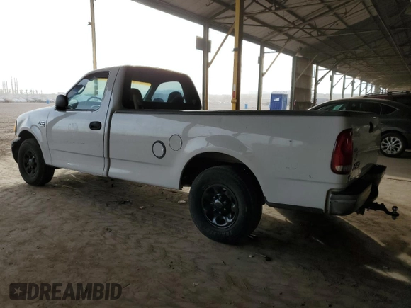 2001 Ford F-150 XL with VIN 2FTPF17Z41CA93204, listed as a Copart auction lot 86637324 with 121,331 mi miles and Salvage title. Bid and sale history available at DreamBid. Image 2.