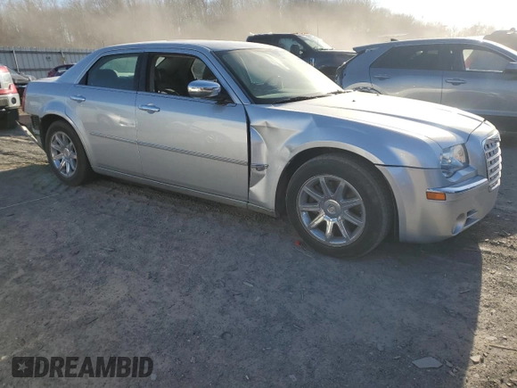 2006 Chrysler 300 C with VIN 2C3KA63H36H206819, listed as a Copart auction lot 46426165 with 64,937 mi miles and Salvage Title. Bid and sale history available at carsss.com. Image 4.
