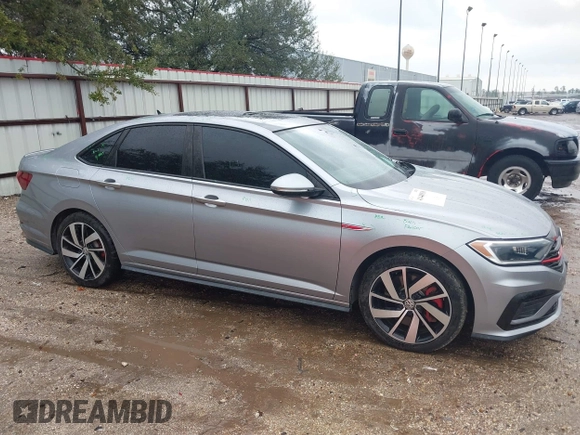 2021 Volkswagen Jetta GLI S with VIN 3VW6T7BU2MM021376, listed as a IAAI auction lot 41448938 with 59,016 mi miles and . Bid and sale history available at DreamBid. Image 14.