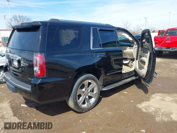 2017 GMC Yukon Denali with VIN 1GKS2CKJ0HR185365, listed as a IAAI auction lot 41856187 with 107,641 mi miles. Bid and sale history available at carsss.com. Image 4.