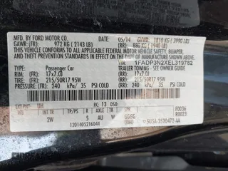 2014 Ford Focus Titanium with VIN 1FADP3N2XEL319782, listed as a IAAI auction lot 42615481 with 132,423 mi miles and . Bid and sale history available at DreamBid. Image 9.