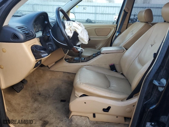 1999 Mercedes-Benz M-Class with VIN 4JGAB72E0XA077256, listed as a Copart auction lot 87998775 with 0 mi miles and Salvage Title. Bid and sale history available at carsss.com. Image 7.