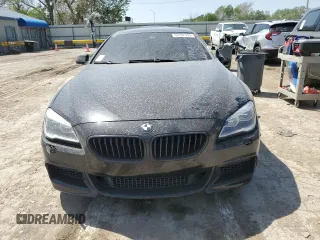 2016 BMW 6 Series 650i xDrive z VIN WBA6D6C57GG388027, wystawiony jako Copart lot #53157535 z przebiegiem 52 147 mil mil oraz Szkody całkowita. Historia ofert i sprzedaży dostępna na DreamBid. Obrazek 5.