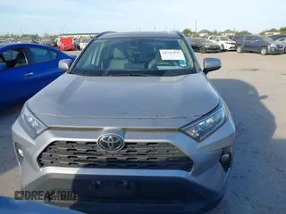 2021 Toyota RAV4 XLE Premium with VIN 2T3C1RFV1MC142071, listed as a IAAI auction lot 41747935 with 82,427 mi miles. Bid and sale history available at carsss.com. Image 12.