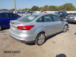 2017 Ford Focus Titanium with VIN 1FADP3J25HL268315, listed as a IAAI auction lot 41606289 with Not provided miles and . Bid and sale history available at DreamBid. Image 4.