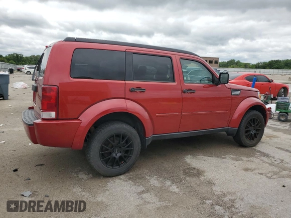 2007 Dodge Nitro SXT with VIN 1D8GU28K57W662816, listed as a Copart auction lot 56965655 with 182,614 mi miles and Salvage title. Bid and sale history available at DreamBid. Image 3.