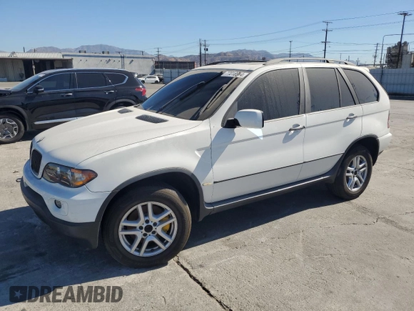 2006 BMW X5 3.0i with VIN 5UXFA135X6LY28695, listed as a Copart auction lot 77018914 with 209,013 mi miles and Salvage Title. Bid and sale history available at carsss.com. Image 1.