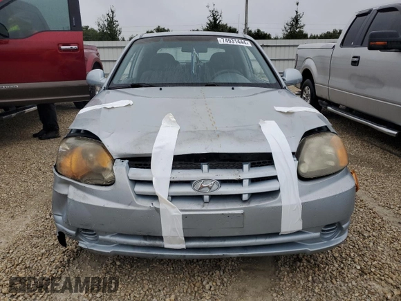 2005 Hyundai Accent GLS with VIN KMHCG35C75U354574, listed as a Copart auction lot 74931444 with 141,013 mi miles and Salvage Title. Bid and sale history available at carsss.com. Image 5.