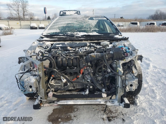 2022 Toyota Camry Hybrid SE with VIN 4T1G31AK7NU586705, listed as a Copart auction lot 83523564 with 56,638 mi miles and Salvage Title. Bid and sale history available at carsss.com. Image 5.
