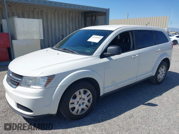 2014 Dodge Journey SE with VIN 3C4PDCAB4ET193896, listed as a IAAI auction lot 42126565 with 242,108 mi miles and . Bid and sale history available at carsss.com. Image 2.