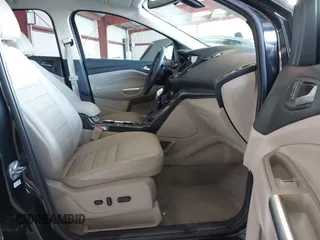 2015 Ford Escape Titanium with VIN 1FMCU0J98FUB95597, listed as a IAAI auction lot 41785188 with 84,141 mi miles. Bid and sale history available at carsss.com. Image 5.