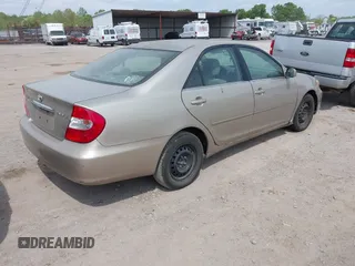 2004 Toyota Camry LE with VIN 4T1BE32K14U846576, listed as a IAAI auction lot 42086537 with 202,027 mi miles. Bid and sale history available at carsss.com. Image 4.
