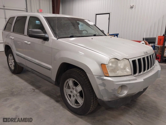 2007 Jeep Grand Cherokee Laredo with VIN 1J8GR48K57C687365, listed as a IAAI auction lot 42038456 with 162,343 mi miles. Bid and sale history available at carsss.com. Image 1.