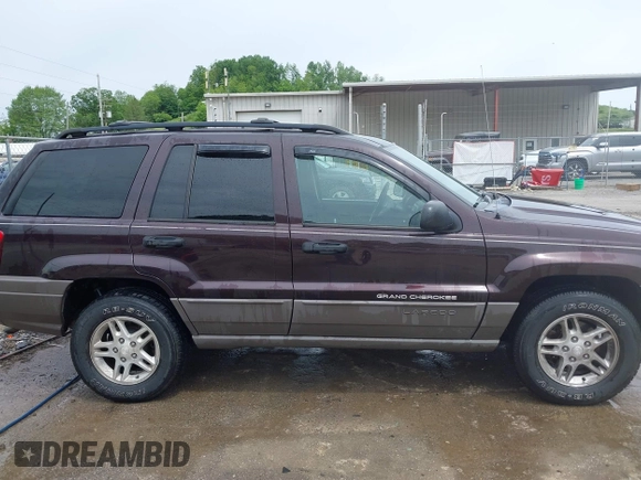 2004 Jeep Grand Cherokee Laredo z VIN 1J4GW48S94C209326, wystawiony jako IAAI lot #42309565 z przebiegiem 159 429 mil mil oraz . Historia ofert i sprzedaży dostępna na DreamBid. Obrazek 13.