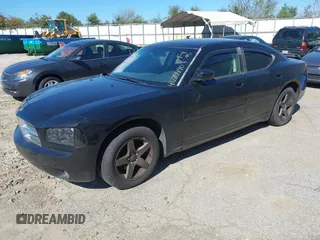 2010 Dodge Charger SXT with VIN 2B3CA3CV3AH100403, listed as a IAAI auction lot 41789490 with 179,370 mi miles and . Bid and sale history available at DreamBid. Image 2.