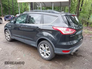 2013 Ford Escape SEL z VIN 1FMCU9H92DUA84826, wystawiony jako IAAI lot #42467606 z przebiegiem 172 334 mil mil oraz . Historia ofert i sprzedaży dostępna na DreamBid. Obrazek 3.