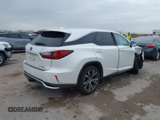 2018 Lexus RX 350L Premium z VIN JTJDZKCAXJ2010125, wystawiony jako IAAI lot #41899420 z przebiegiem 113 995 mil mil oraz . Historia ofert i sprzedaży dostępna na DreamBid. Obrazek 4.