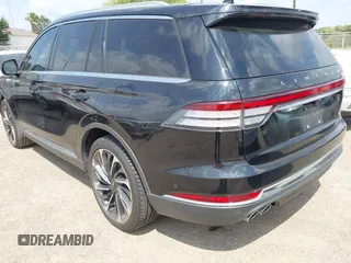 2020 Lincoln Aviator Reserve z VIN 5LM5J7XC9LGL24872, wystawiony jako IAAI lot #42112310 z przebiegiem 20 661 mil mil oraz . Historia ofert i sprzedaży dostępna na DreamBid. Obrazek 3.