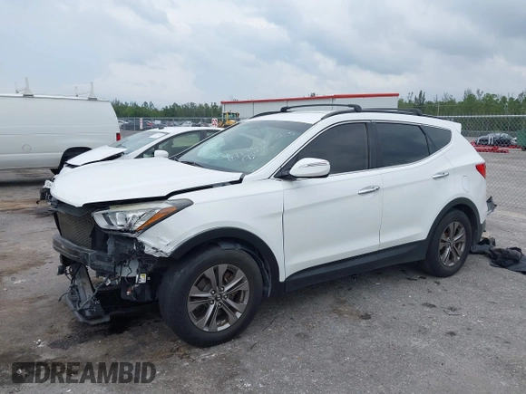 2014 Hyundai Santa Fe with VIN 5XYZU3LB9EG229255, listed as a IAAI auction lot 42407410 with 201,523 mi miles and . Bid and sale history available at DreamBid. Image 2.
