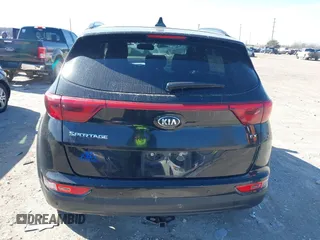 2018 Kia Sportage EX with VIN KNDPNCAC9J7324292, listed as a IAAI auction lot 41859338 with 124,519 mi miles and . Bid and sale history available at carsss.com. Image 16.